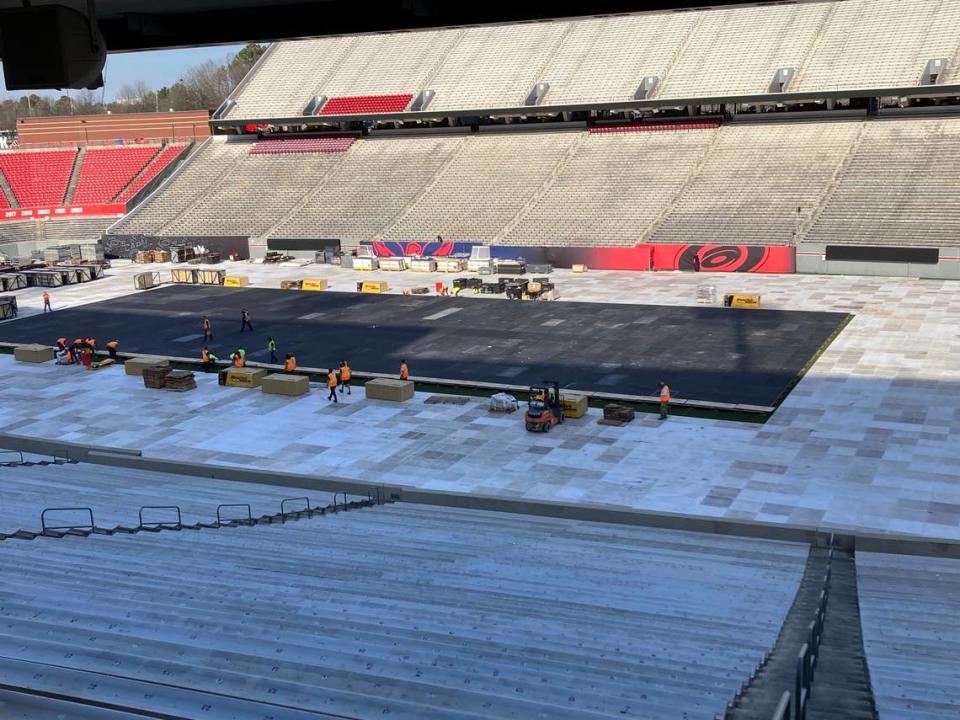 The outline of the hockey rink to be used in the Carolina Hurricanes’ Stadium Series outdoor game against Washington is placed at NC State’s Carter-Finley Stadium. (Chip Alexander)