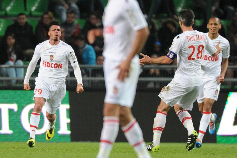 Monaco's Emmanuel Riviere (L) celebrates after scoring during their Ligue 1 match against Rennes in western France on April 12, 2014