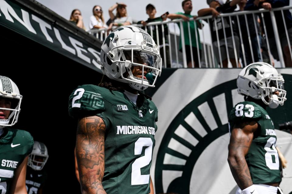 Michigan State's Tyrell Henry and other MSU receivers take the field before the football game against Richmond on Saturday, Sept. 9, 2023, at Spartan Stadium in East Lansing.