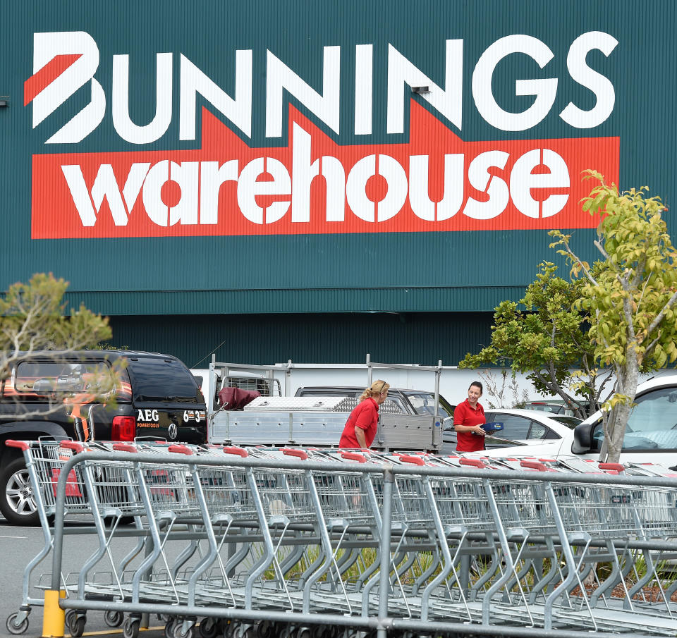 A Bunnings store front with trolleys. Most Western Australia stores will close at 7pm on Monday.