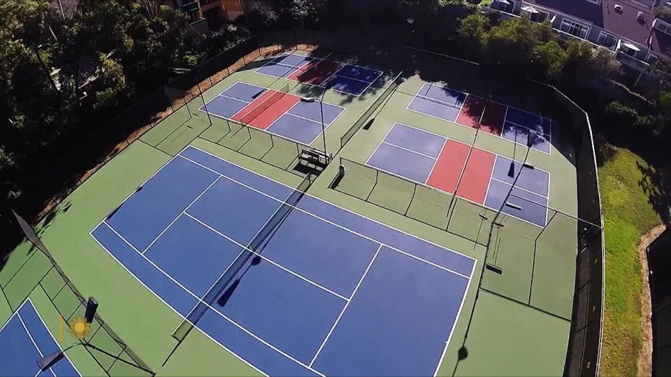 Pickleball courts measure 44 feet by 20 feet, roughly half the size of a tennis court (78 x 36 feet).  / Credit: CBS News