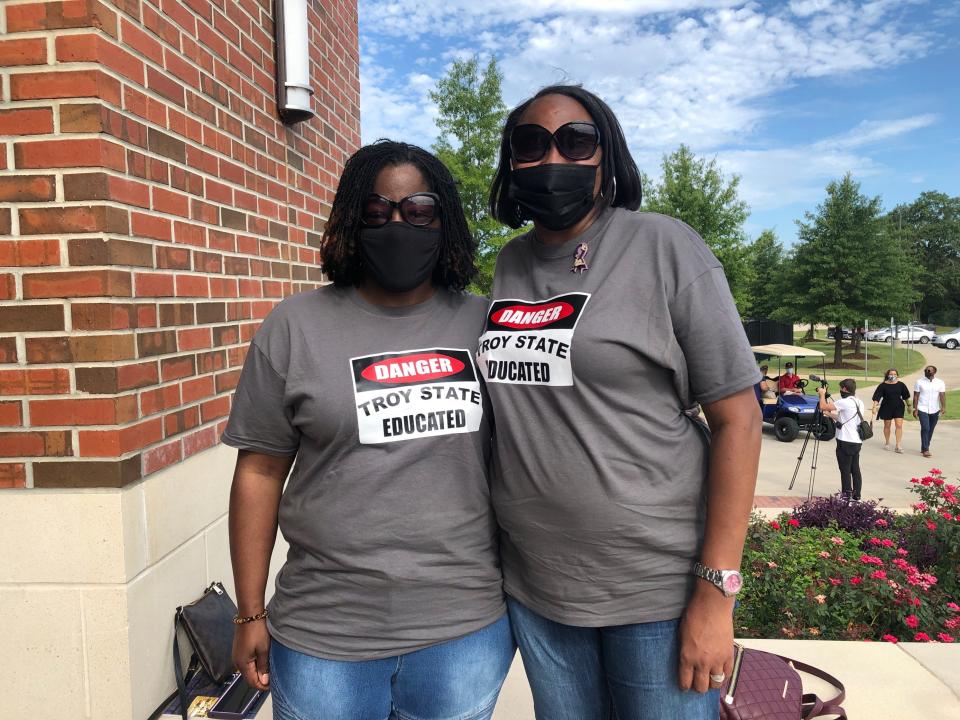 Rosalyn Butler, left, and Makesha Sampson attend the memorial service honoring John Lewis at Troy Arena in Troy, Alabama, on July, 25, 2020