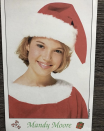 <p>The <em>This is Us</em> star got into the Christmas spirit on Thursday, posting this throwback of herself in a Santa hat. “If you’re wondering why I had a holiday-themed headshot,” she wrote, “I honestly don’t have an answer for you.” (Photo: <a rel="nofollow noopener" href="https://www.instagram.com/p/BcIiIibHQgw/?taken-by=mandymooremm" target="_blank" data-ylk="slk:Mandy Moore via Instagram;elm:context_link;itc:0;sec:content-canvas" class="link ">Mandy Moore via Instagram</a>) </p>