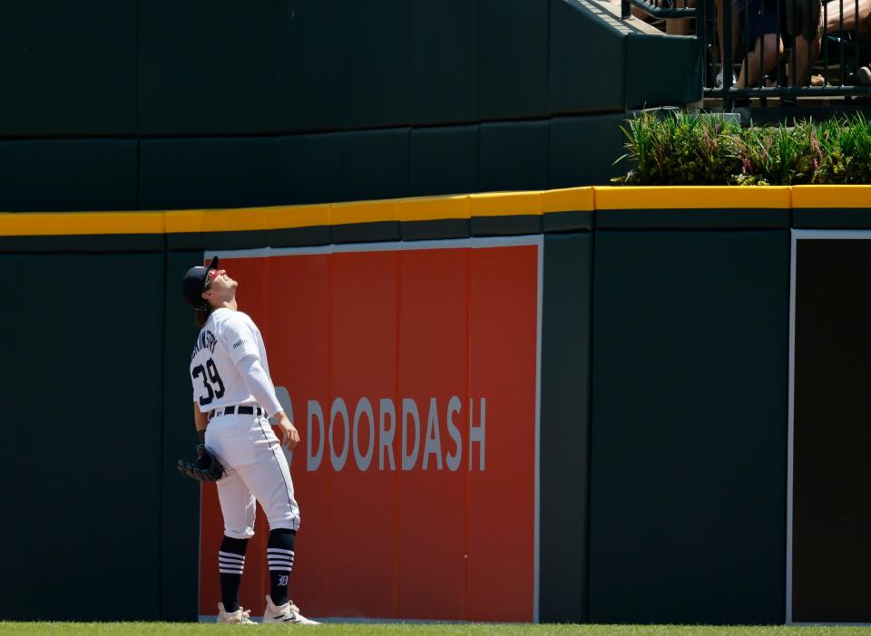 Detroit Tigers right fielder Zach McKinstry watches a home run hit by Texas Rangers' Corey Seager during the fifth inning of a baseball game on Monday, May 29, 2023, in Detroit at Comerica Park.