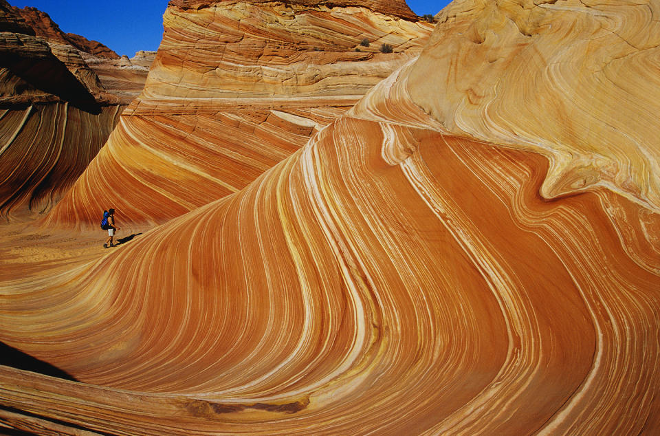 Man Backpacking at Vermilion Cliffs