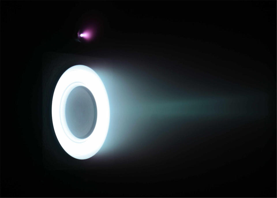 An Aerojet Hall thruster is shown in operation.