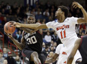 Harvard's Kyle Casey (30) tries to hold onto a rebound in front of Cincinnati's Jermaine Lawrence during the first half of a second-round game in the NCAA college basketball tournament in Spokane, Wash., Thursday, March 20, 2014. (AP Photo/Elaine Thompson)