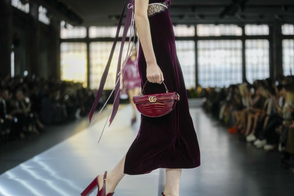 A model wears a creation as part of the Gucci women's Fall-Winter 2024-25 collection presented in Milan, Italy, Friday, Feb. 23, 2024. (AP Photo/Luca Bruno)