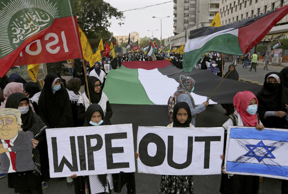 Shiite Muslims women and children take part in anti-Israel rally, in Karachi, Pakistan, Sunday, May 16, 2021. (AP Photo/Fareed Khan)