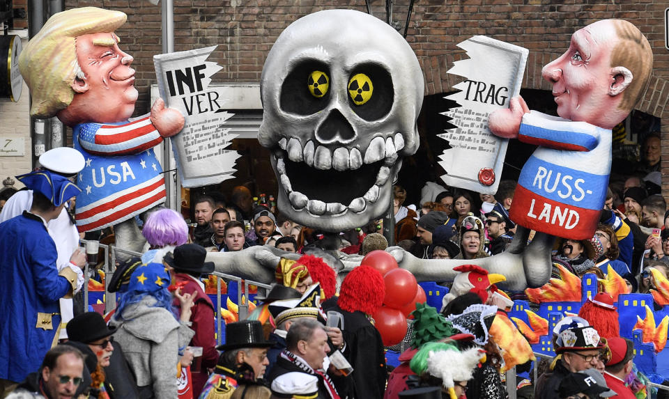 A carnival float depicts Donald Trump and Vladimir Putin cutting the INF Treaty during to the traditional carnival parade in Duesseldorf, Germany, on March 4, 2019. (Photo: Martin Meissner/AP)