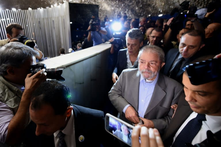 Former Brazilian President Luiz Inacio Lula da Silva and Brazilian musician Chico Buarque attend the impeachment trial to suspended Brazilian President Dilma Rousseff, at the National Congress in Brasilia, on August 29, 2016