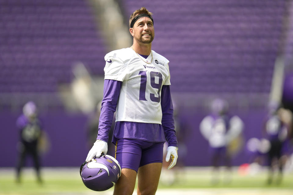 Minnesota Vikings wide receiver Adam Thielen (19) looks on during the NFL football team's training camp at US Bank Stadium in Minneapolis, Friday, July 29, 2022. (AP Photo/Abbie Parr)