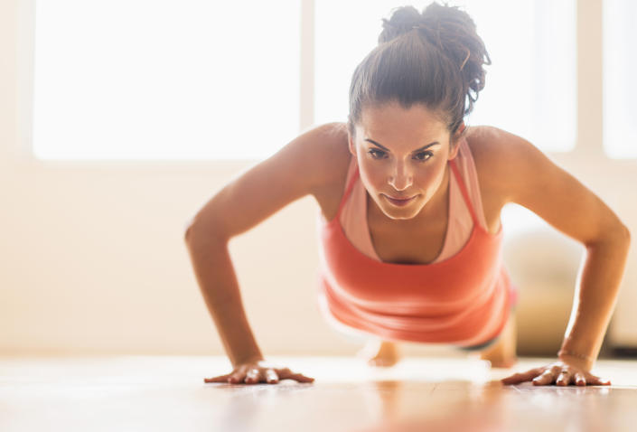 Woman doing press ups. (Getty Images)