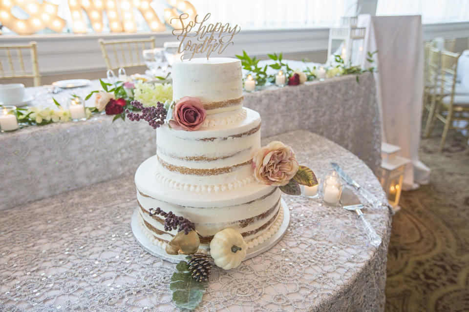 Photos of a simple wedding cake at North American wedding reception.