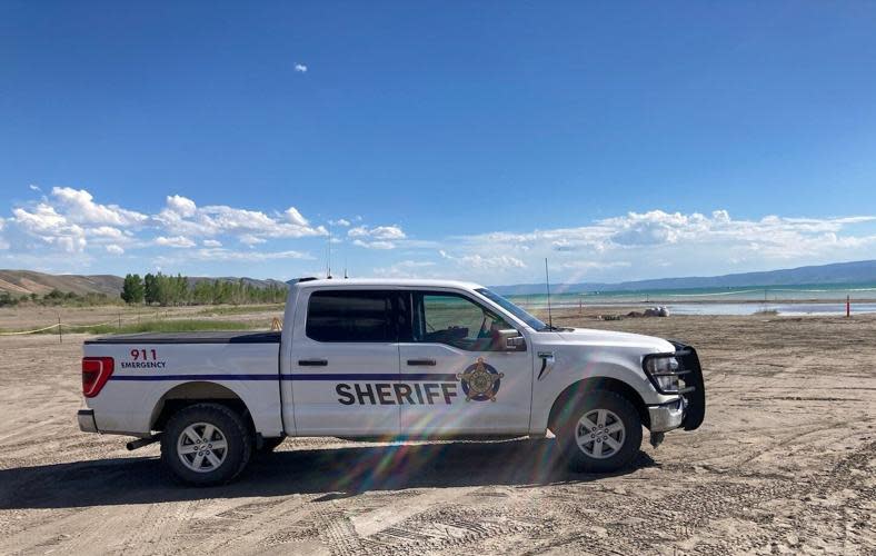 A Bear Lake County Sheriff's Office vehicle parked on the east shore of Bear Lake in Idaho.