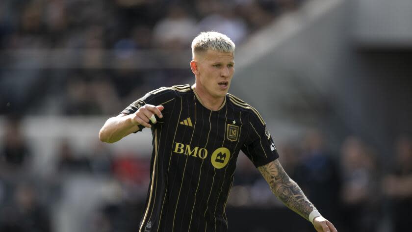 LAFC midfielder Mateusz Bogusz runs on the field against Seattle.