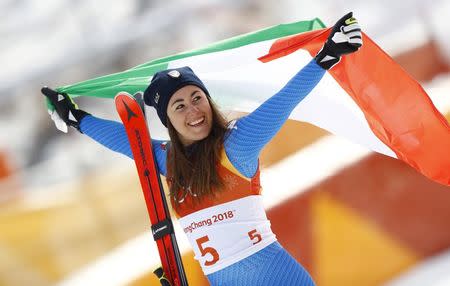 Alpine Skiing - Pyeongchang 2018 Winter Olympics - Women's Downhill - Jeongseon Alpine Centre - Pyeongchang, South Korea - February 21, 2018 - Sofia Goggia of Italy reacts during the victory ceremony. REUTERS/Kai Pfaffenbach