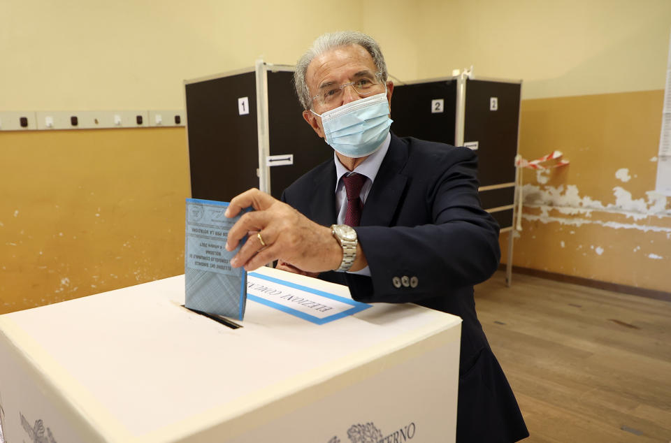 Former Italian Premier Romano Prodi casts his ballot in Bologna, Italy, Sunday, Oct. 3, 2021. Millions of people in Italy started voting Sunday for new mayors, including in Rome and Milan, in an election widely seen as a test of political alliances before nationwide balloting just over a year away. (Michele Nucci/LaPresse via AP)