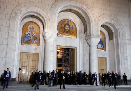 Serbian President Aleksandar Vucic, Russian President Vladimir Putin and Serbian Orthodox Church Patriarch Irinej leave the St Sava temple in Belgrade, Serbia, January 17, 2019. REUTERS/Kacper Pempel