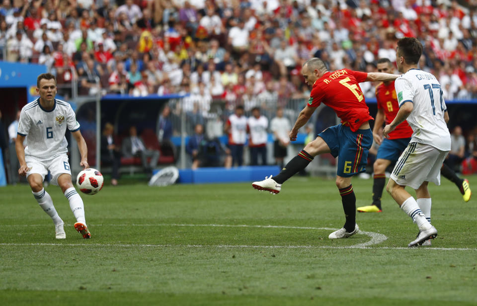 <p>Andres Iniesta gets closest to scoring for Spain in the second half as his rasping shot is saved by Igor Akinfeev </p>