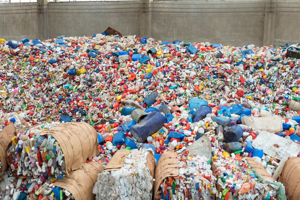 A veritable mountain of intercepted ocean plastics at Yardbird's partner facility in Manila.