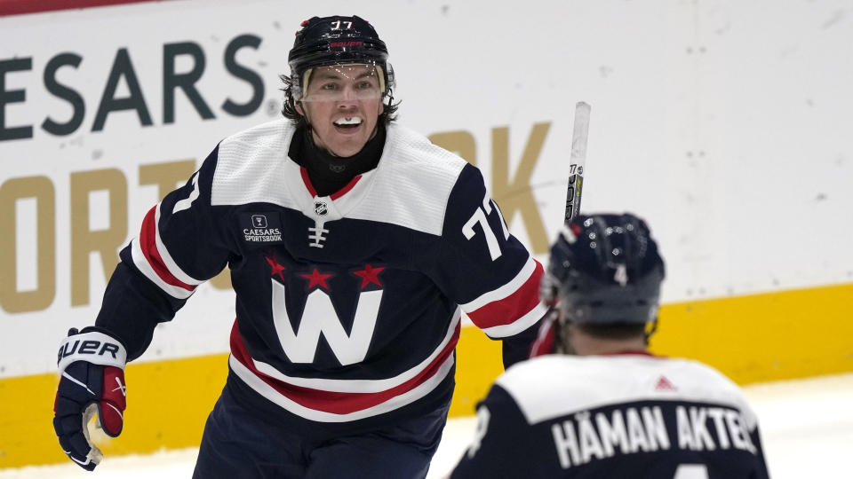 Will more NHL players follow T.J. Oshie's lead after the Adam Johnson tragedy? (AP Photo/Mark Schiefelbein)