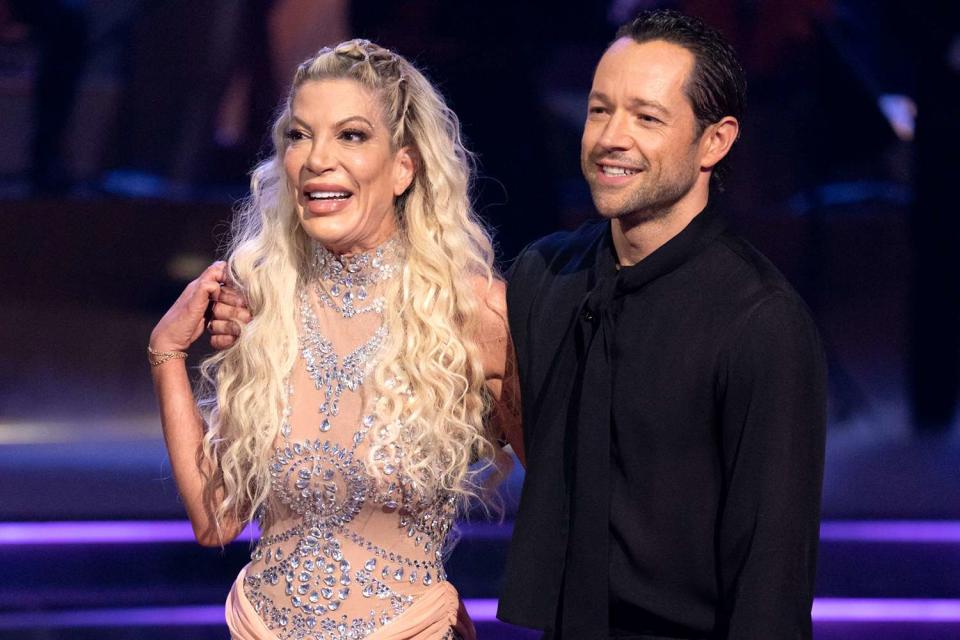 <p>Disney/Eric McCandless</p> (L-R) Tori Spelling and Pasha Pashkov on Dancing with the Stars on September 24, 2024.