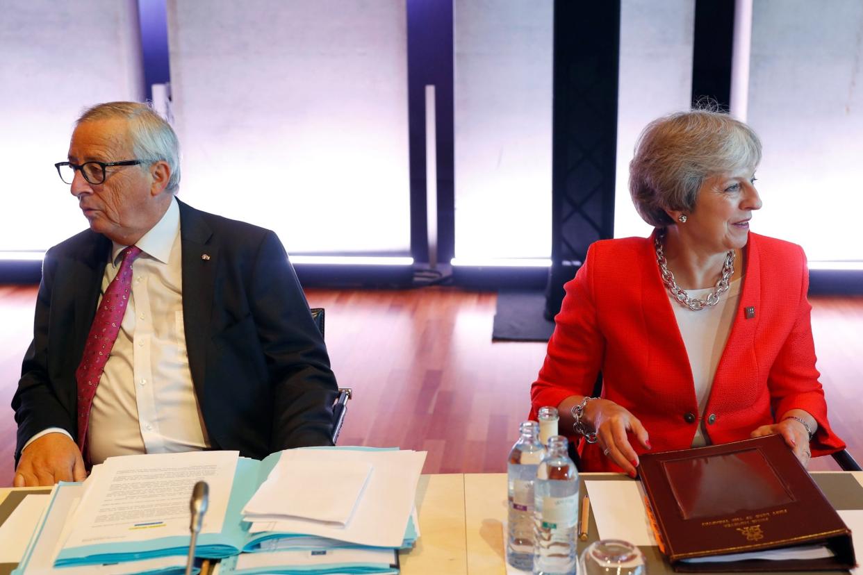 Theresa May and European Commission President Jean-Claude Juncker in Salzberg earlier this month: REUTERS