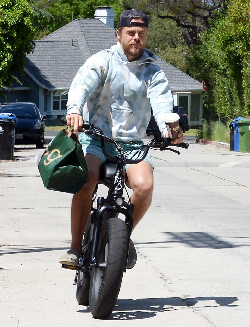 <p>Derek Hough takes a bike ride with his girlfriend, Hayley Erbert, in Sherman Oaks, California on Tuesday.</p>