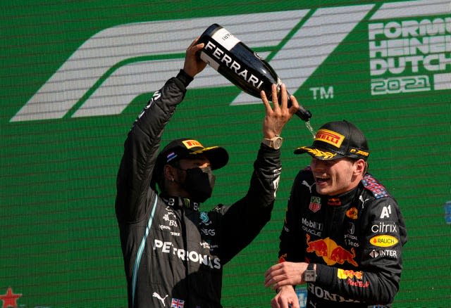 Red Bull driver Max Verstappen, right, replaced Lewis Hamilton on top of the F1 standings 