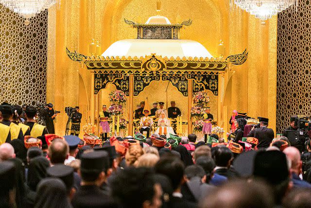 <p>IQBAL DATO HJ SELAMAT/AFP via Getty</p> Prince Abdul Mateen and Anisha at their wedding ceremony on Jan. 14, 2023