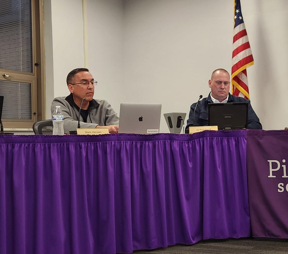 Pickerington Board of Education Member Mark Hensen, left, was censured Monday night by other board members that said he was improperly communicating with the superintendent and faculty members.