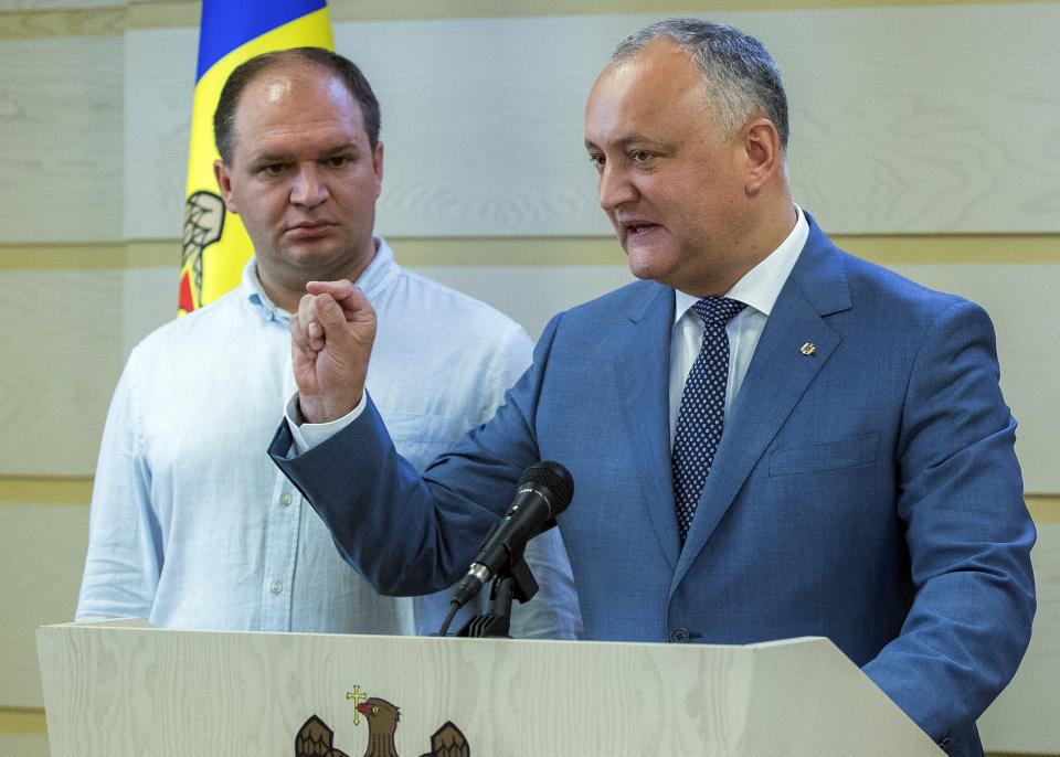 Moldova's President Igor Dodon gestures during press statements in Chisinau, Moldova, Thursday, June 13, 2019. Russian President Vladimir Putin on Thursday strongly backed Moldova's new coalition government, which has been locked in a power struggle with a rival group amid a surge in political tensions in the ex-Soviet nation. (AP Photo/Roveliu Buga)