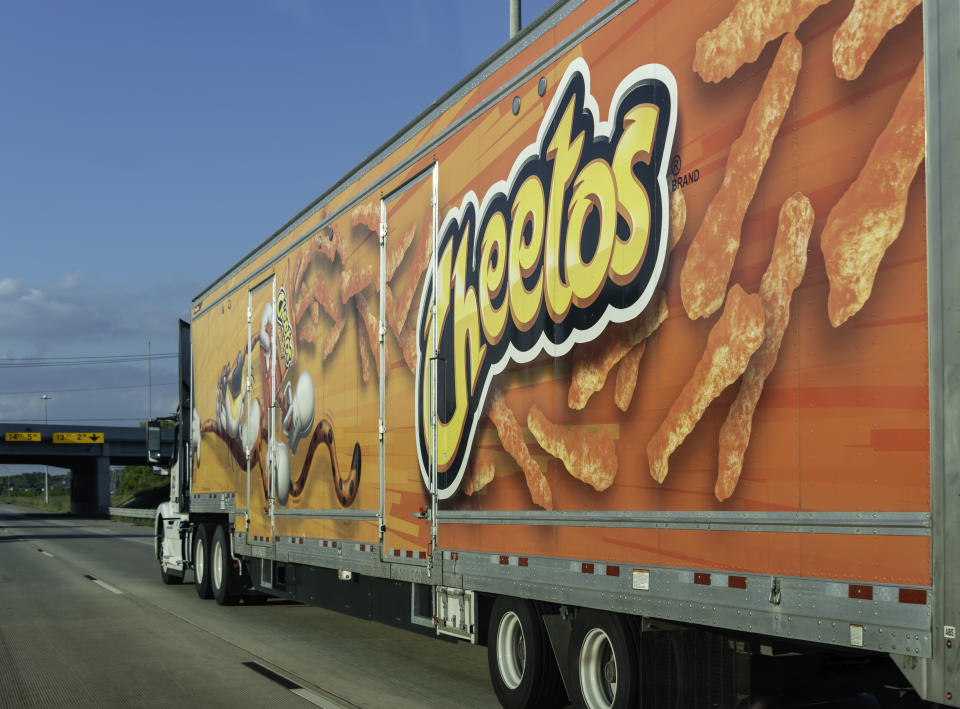 A semi-truck carrying Cheetos snacks on Interstate 75 outside of Woodhaven, Michigan. Cheetos are a snack food made by Pepsi subsidiary Frito-Lay.