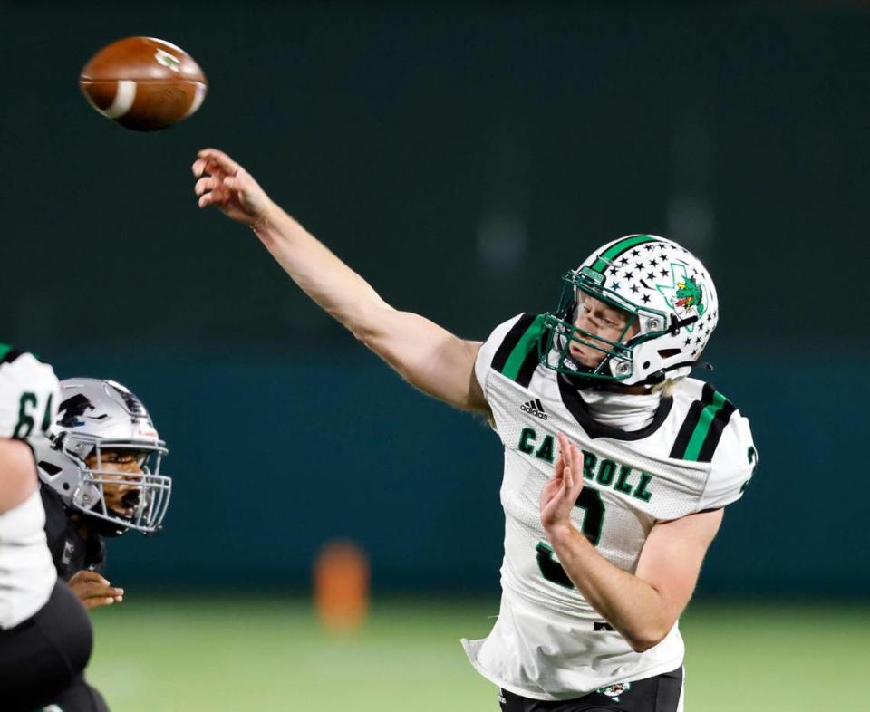 Southlake Carroll Quinn Ewers (3) throws an incompletion down field during a Conference 6A Division 1 regional playoff football game at Globe Life Park in Arlington, Texas, Friday, Dec. 24, 2020. Southlake Carroll defeated Arlington Martin 30-26. (Special to the Star-Telegram Bob Booth)