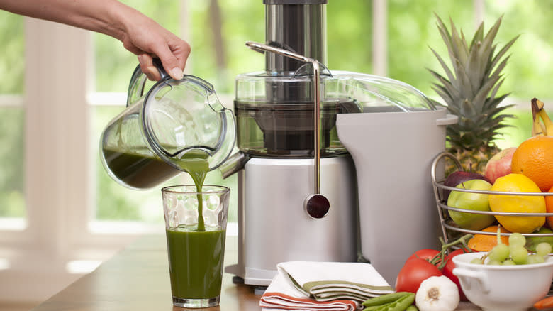 Juicer with vegetables and fruits