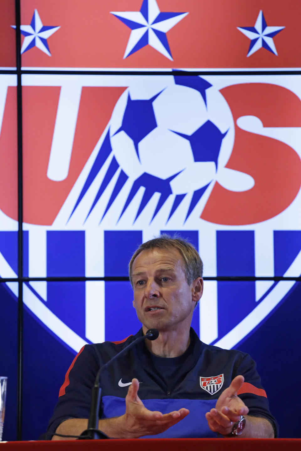 Head coach of United States soccer team, Jurgen Klinsmann, talks during a press conference after a training session in Sao Paulo, Brazil, Tuesday, Jan. 14, 2014. The US national soccer team is on a training program to prepare for the World Cup tournament that starts in June. (AP Photo/Nelson Antoine)