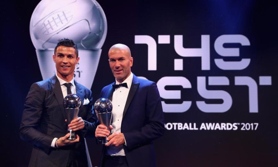 Cristiano Ronaldo celebrates winning the Fifa world player of the year for a fifth time with his Real Madrid manager Zinedine Zidane, who was named best coach. 