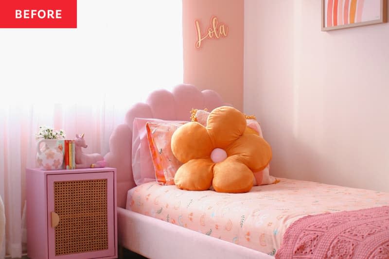 soft pink walls, flower headboard pink twin bed, pink nightstand with wicker caning on front, orange flower pillow