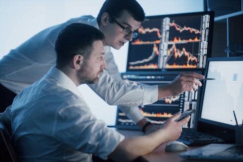 <span class="caption">Making sense of the reds and the greens.</span> <span class="attribution"><a class="link " href="https://www.shutterstock.com/image-photo/team-stockbrokers-having-conversation-dark-office-1183475005" rel="nofollow noopener" target="_blank" data-ylk="slk:Standret;elm:context_link;itc:0;sec:content-canvas">Standret</a></span>