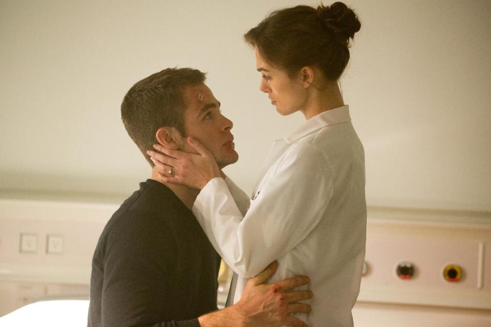 This image released by Paramount Pictures shows Keira Knightley, right, and Chris Pine in "Jack Ryan: Shadow Recruit," an action thriller about a covert CIA analyst who uncovers a Russian plot to crash the U.S. economy with a terrorist attack. (AP Photo/Paramount Pictures, Larry Horricks)