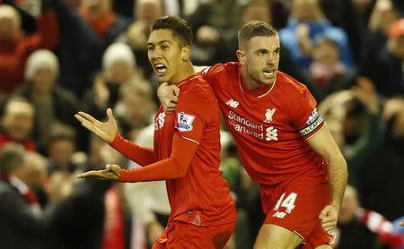 Football Soccer - Liverpool v Arsenal - Barclays Premier League - Anfield - 13/1/16 Roberto Firmino celebrates scoring the second goal for Liverpool with Jordan Henderson Action Images via Reuters / Carl Recine Livepic