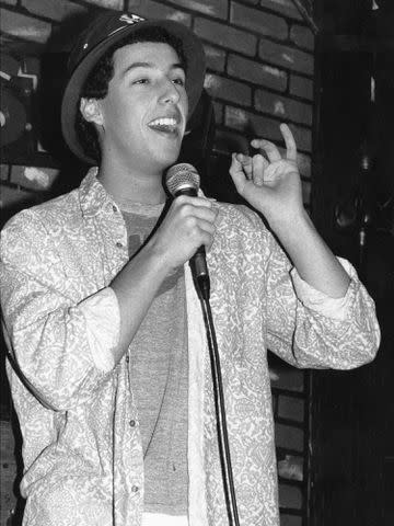 <p>William LaForce Jr./NY Daily News Archive/Getty</p> Adam Sandler at the Comic Strip