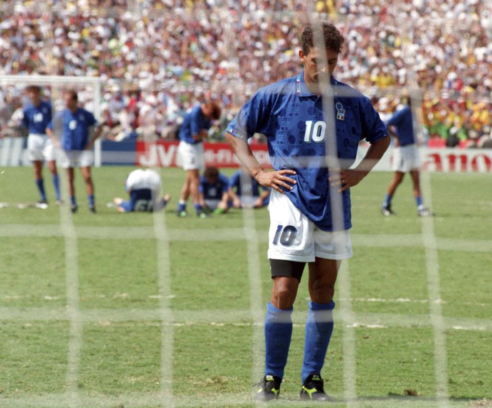 FILE - Roberto Baggio of Italy looks disappointed after Brazilian goalkeeper Taffarel saved his penalty shot, during the World Cup Final, in Pasadena, Ca., USA, on July 17, 1994. Brazil defeated Italy 3-2 on penalties in the final to win the World Cup. (AP Photo/Luca Bruno, File)