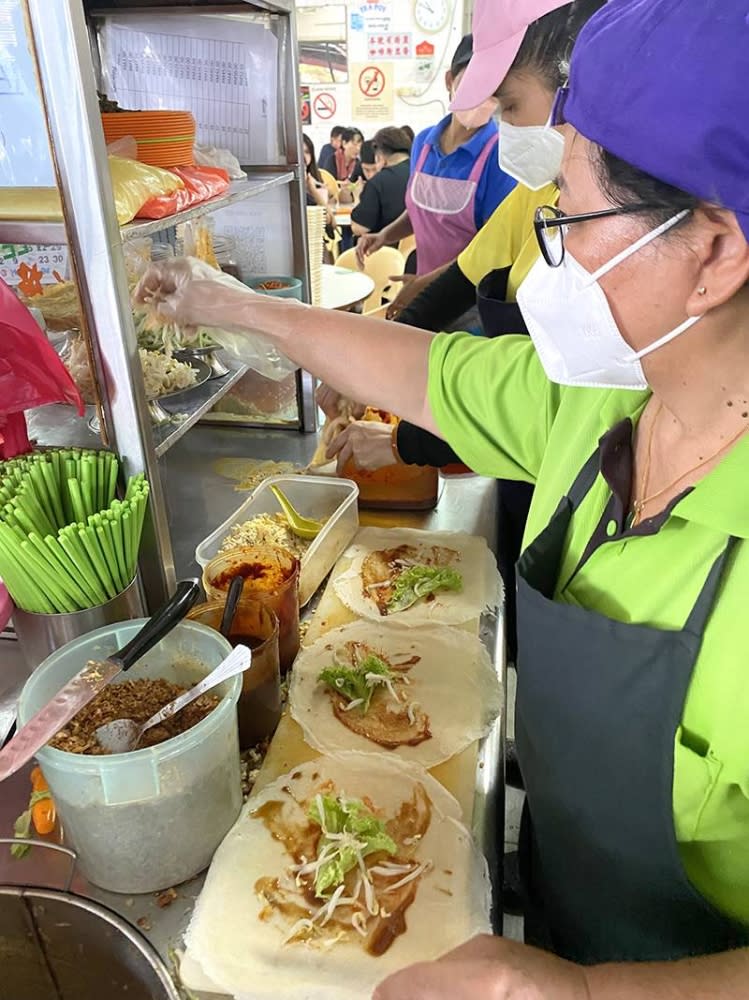 Kam makes the 'popiah' using a recipe handed down from her grandmother.