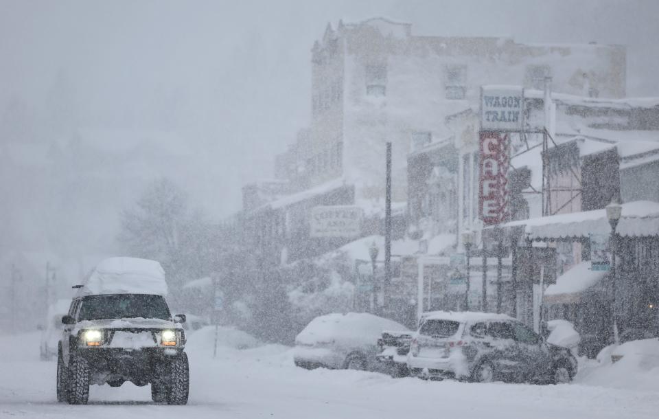 Snow falls downtown, north of Lake Tahoe, during a powerful multiple day winter storm in the Sierra Nevada mountains on March 02, 2024 in Truckee, California.