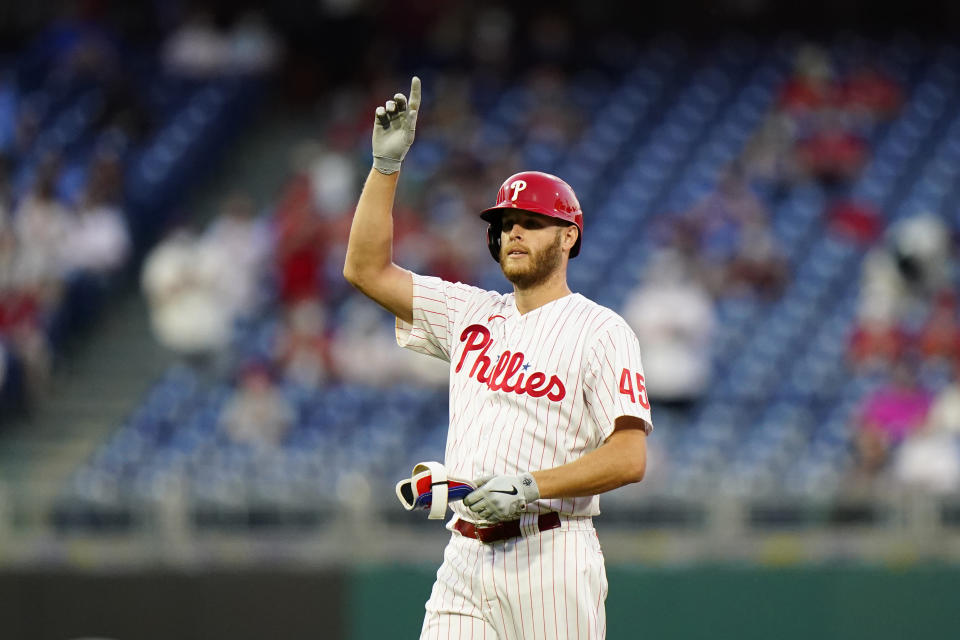 Philadelphia Phillies' Zack Wheeler reacts after hitting a double off Miami Marlins pitcher Cody Poteet during the third inning of baseball game, Tuesday, May 18, 2021, in Philadelphia. (AP Photo/Matt Slocum)