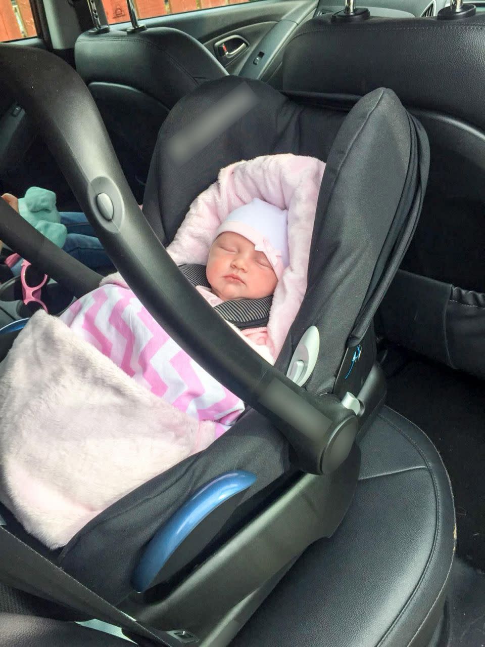 Baby Harper had been in the seat for two hours in peak hour traffic. Photo: Caters News