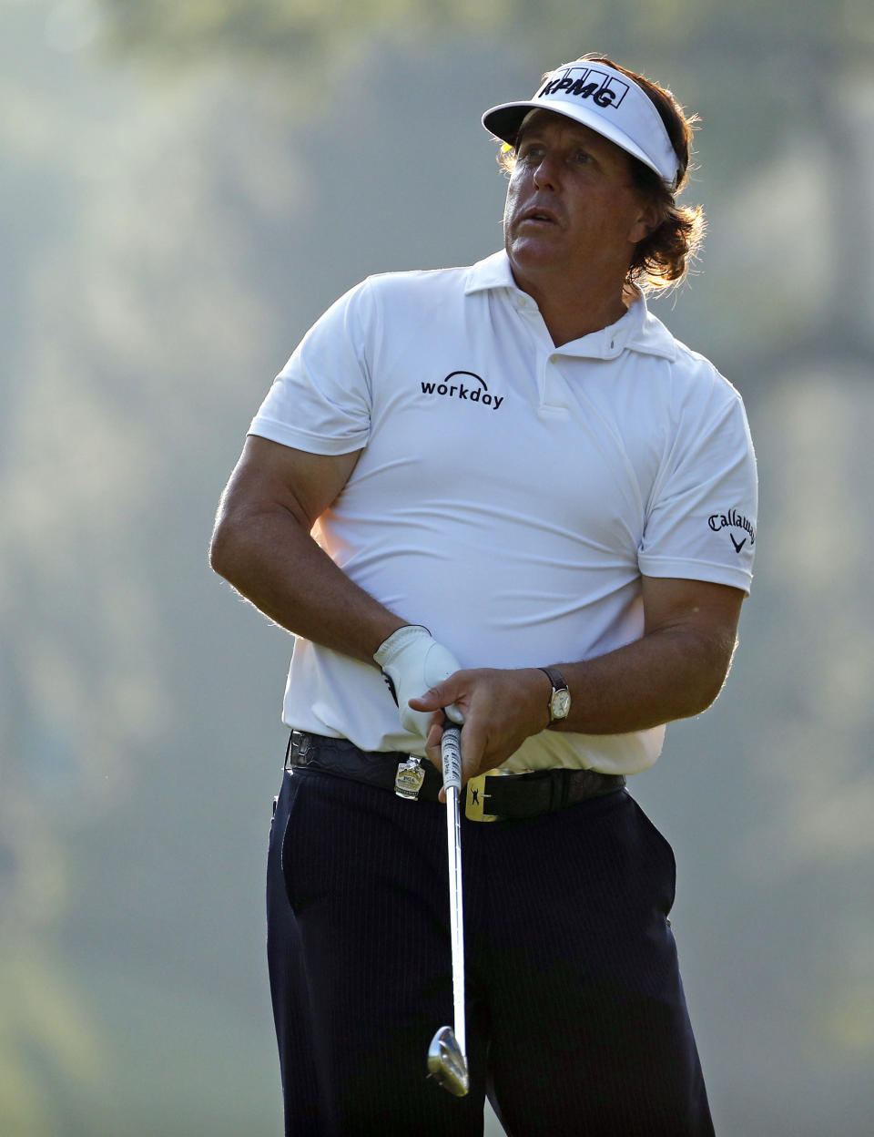 Phil Mickelson watches his tee shot on the 13th hole during the second round of the PGA Championship golf tournament at Bellerive Country Club, Saturday, Aug. 11, 2018, in St. Louis. (AP Photo/Charlie Riedel)