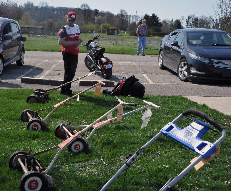 Manual mowers and electric vehicles were on display at Saturday's Scarlet, Gray and Green Fair in Wooster.